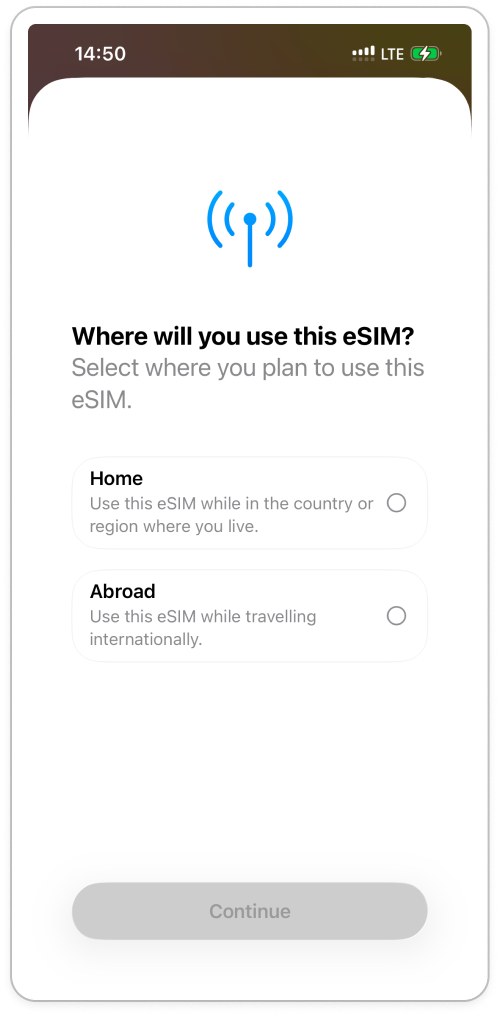 Ventana emergente de iOS que pregunta dónde se usará el plan, con las opciones disponibles de en casa y en el extranjero